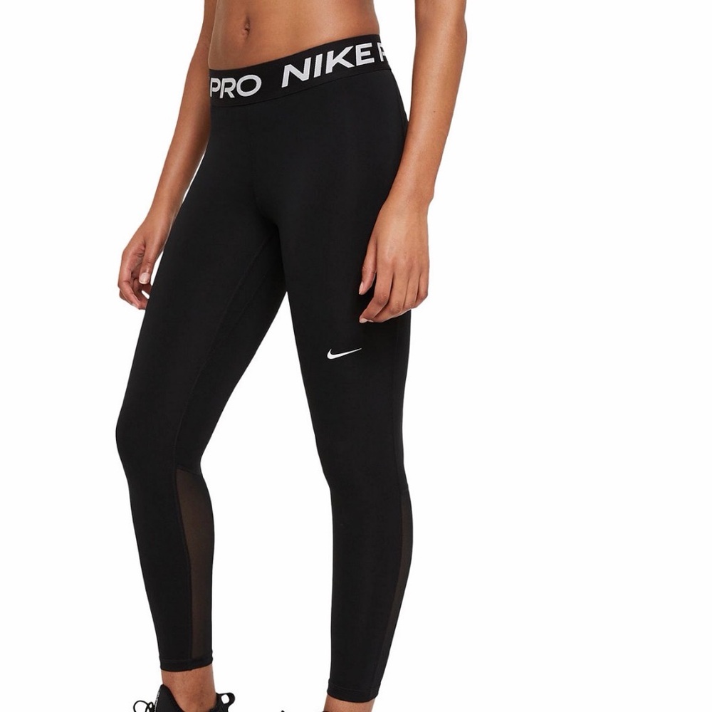 NWT- Nike Pro Mid-Rise Mesh-
Paneled Leggings